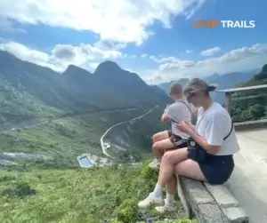 2 customers sitting to see the view of ma pi leng pass