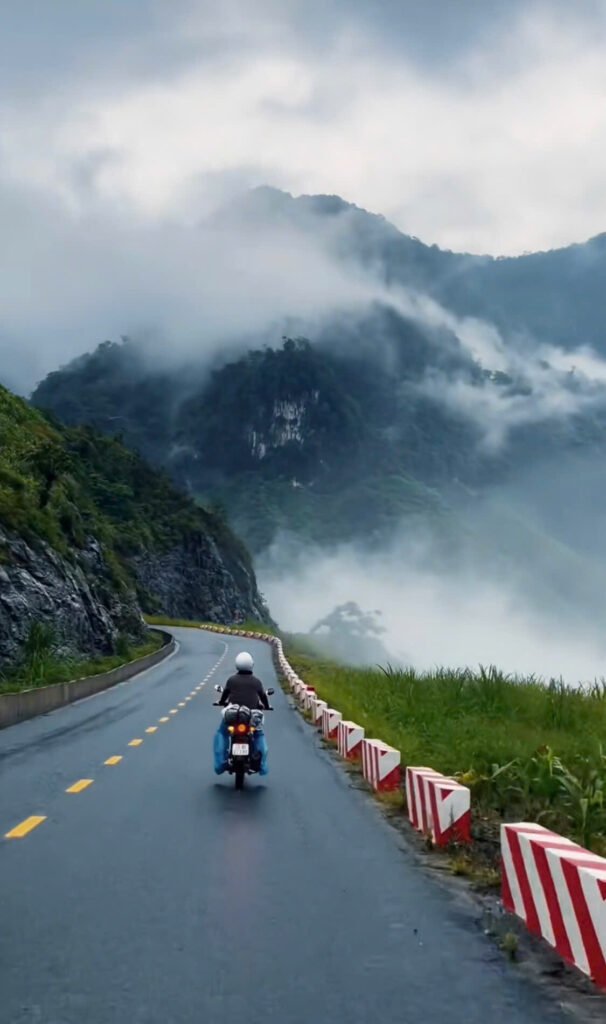 Ma Pi Leng Pass during Ha Giang rainy season with mist and wet mountain roads