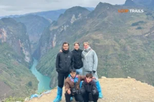 Ma Pi Leng Pass switchback mountain road with Nho Que River winding through canyon