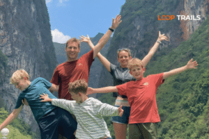 ha giang loop with kids on a boat trip in nho que river