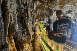 a family doing the ha giang loop with looptrails in lung khuy cave