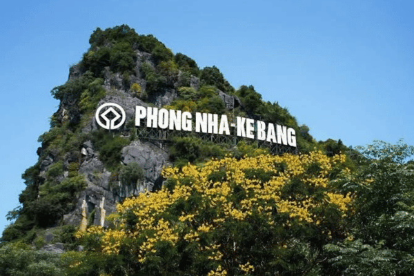 Trekking into the entrance of Hang En cave in Phong Nha Ke Bang National Park caving in vietnam