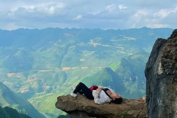 people at sky walk death stone on ha giang loop