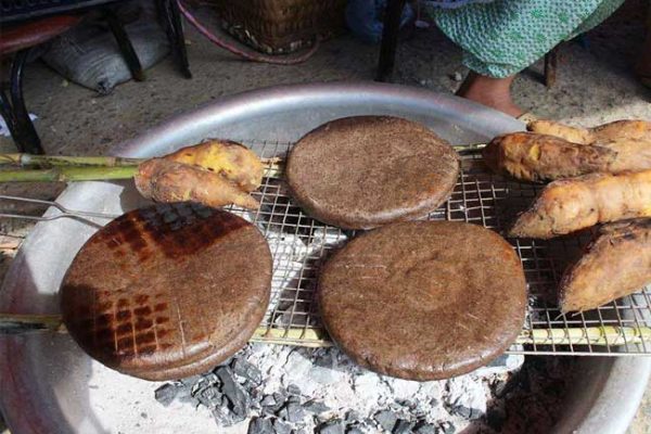 Buckwheat pancakes being made at Dong Van market Ha Giang Loop