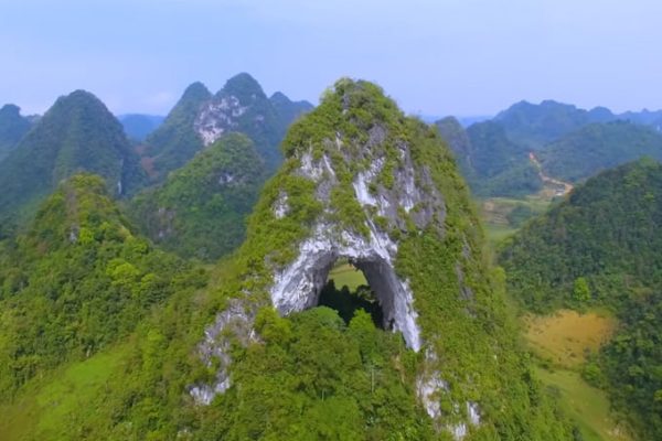 God's Eye Mountain Cao Bang natural rock formation circular hole Vietnam Visiting God's Eye Mountain in Cao Bang, Vietnam