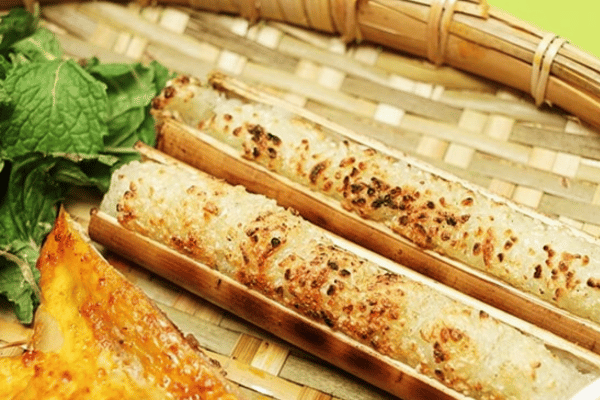 Bamboo roasted sticky rice xoi nep nuong at Ha Giang roadside stall near viewpoint