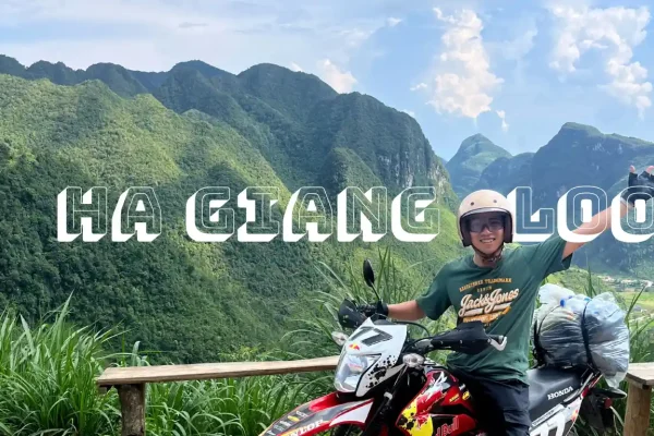 a men on a motorbike at chin khoanh pass on ha giang loop, dong van