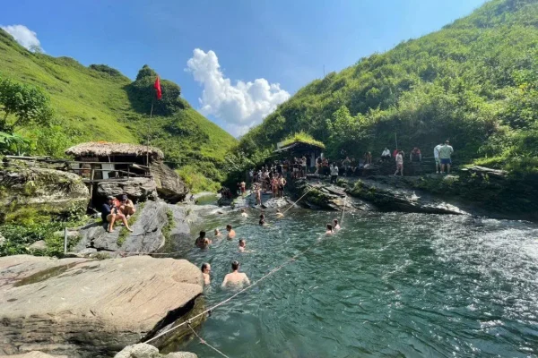 Du Gia waterfall swimming spot on Ha Giang Loop tour northern Vietnam