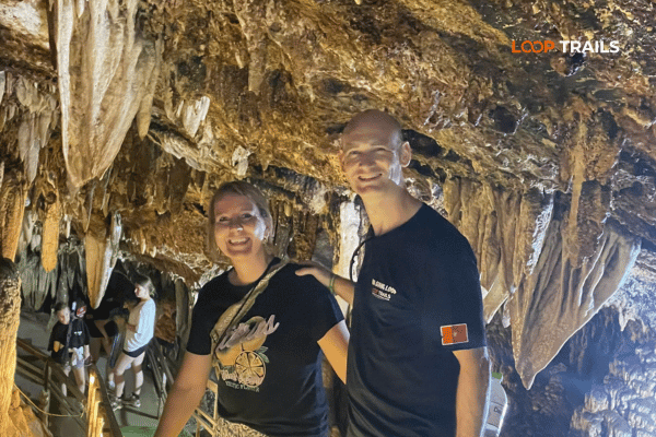 a family doing the ha giang loop with looptrails lung khuy cave