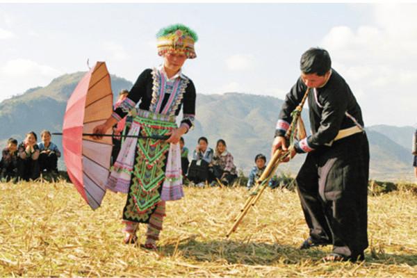 Hmong khèn bamboo mouth organ musician festival Ha Giang Vietnam