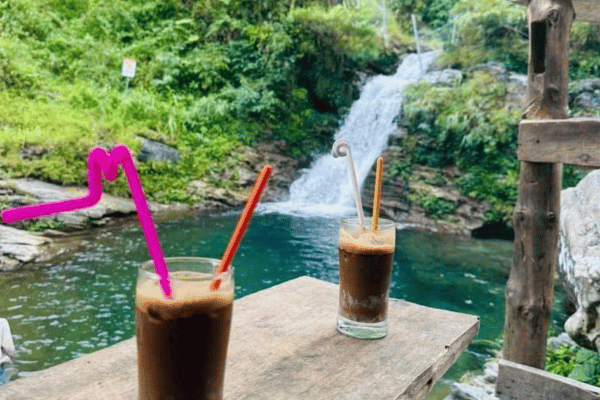 Clear water swimming at Du Gia Waterfall natural pool Ha Giang province