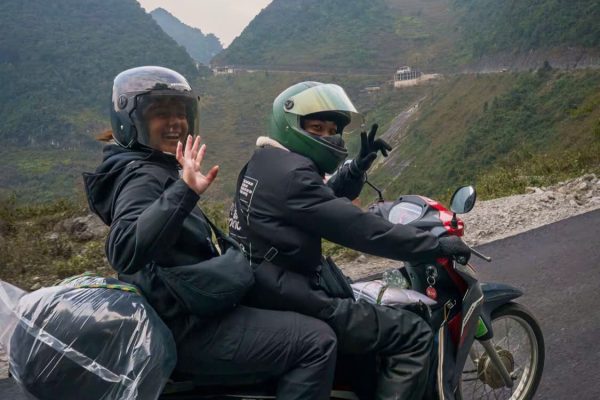 Easy rider passenger enjoying Ha Giang Loop scenery without riding stress Never Ridden a Motorbike
