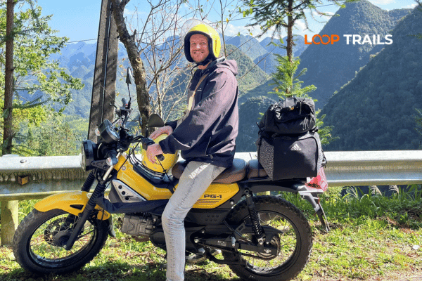 Riding Ma Pi Leng Pass on Ha Giang Loop motorbike tour
