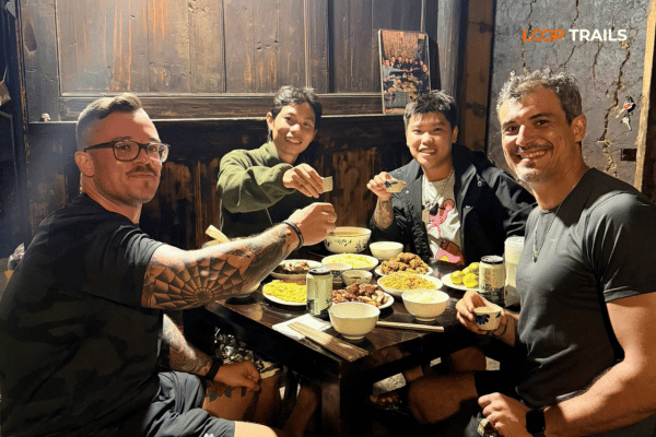 ha giang loop with looptrails have dinner together in a local homestay