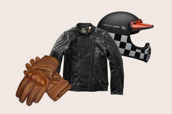 Rider equipped with proper gear riding motorbike on Ha Giang Loop mountain road