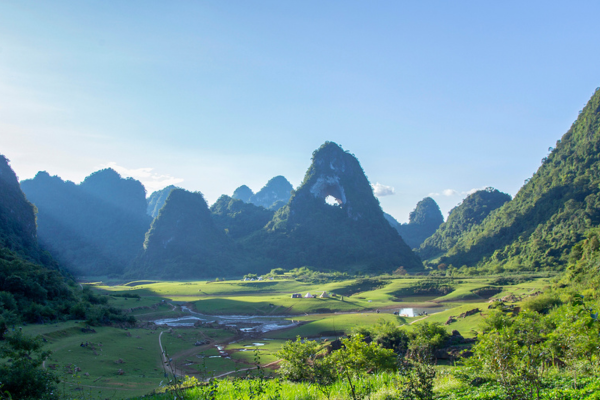 Looking through God's Eye Mountain rock formation Cao Bang Vietnam Visiting God's Eye Mountain in Cao Bang, Vietnam