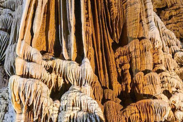 Lung Khuy Cave interior Ha Giang with stalactite formations, northern Vietnam