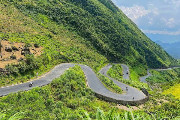 Narrow mountain road on Tham Ma Pass Ha Giang Vietnam