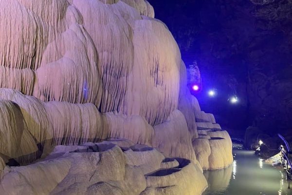 Flowstone formations like frozen waterfall in Nguom Ngao Cave Cao Bang Province