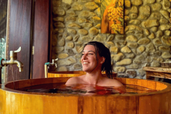 Traditional Red Dao herbal bath barrel inside a homestay in Ha Giang