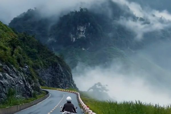 Ma Pi Leng Pass during Ha Giang rainy season with mist and wet mountain roads