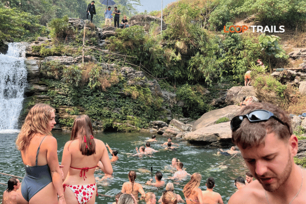 swimming at du gia waterfall in yen minh