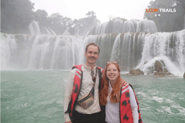 take a boat trip in ban gioc waterfall, cao bang