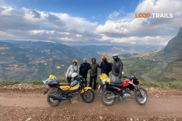 Motorbike parked at ma pi leng pass access road, Ha Giang Loop Vietnam