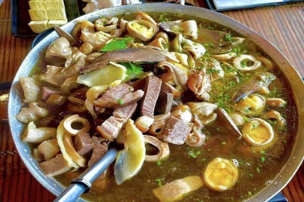 Thang co traditional Hmong hot pot Meo Vac market Ha Giang Vietnam