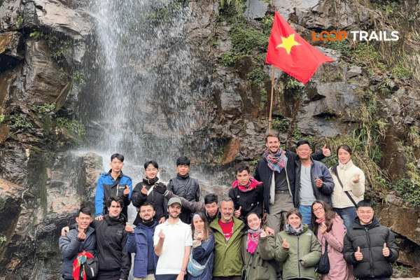 tourist with waterfall in ha giang ha giang adventure