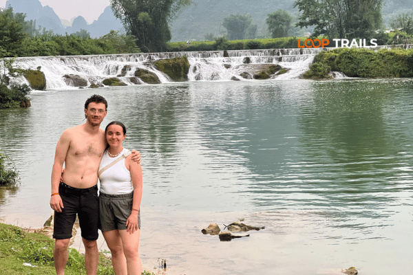 tourists of looptrails in a waterfall in trung khanh,cao bang