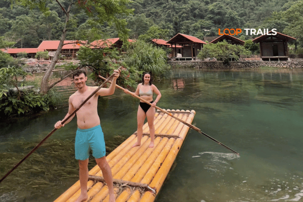 tourists of looptrails on a boat in cao bang