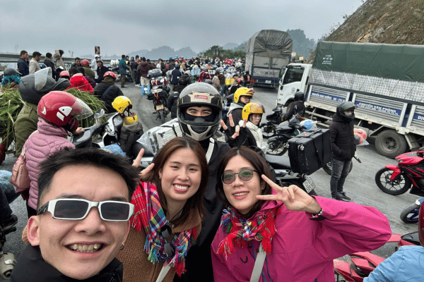 Easy rider passenger enjoying Ha Giang Loop scenery without riding stress