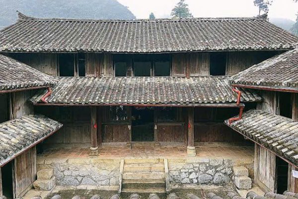 Traditional Chinese wood carvings on beams inside Vuong Palace Dong Van Ha Giang